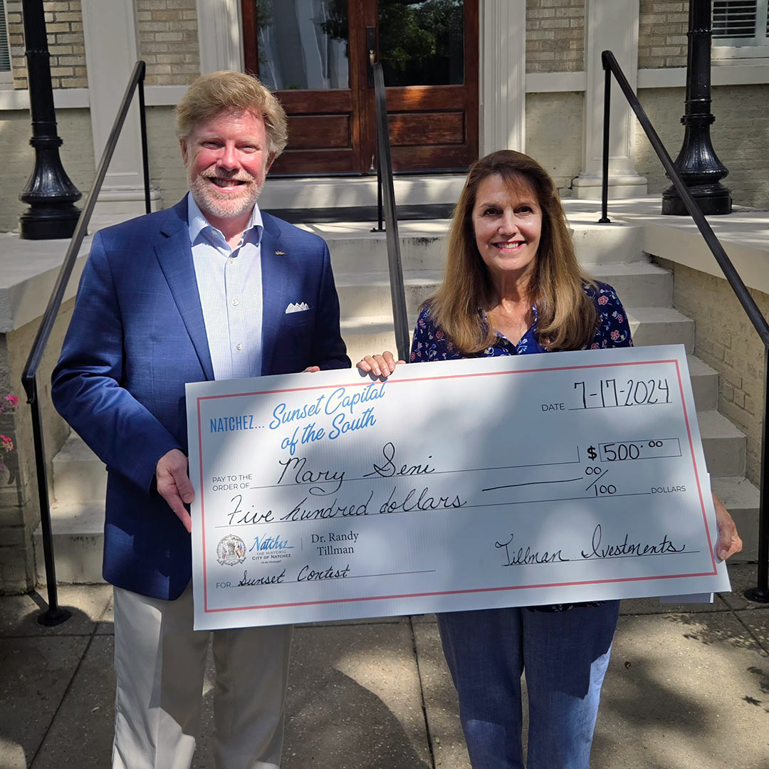 L to R: Mayor Dan Gibson, Mary Seni.<br />
They are holding a giant check to show Seni's $500 First Prize.