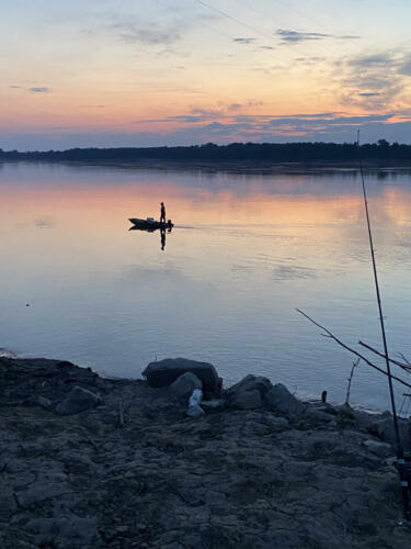 Fishing-on-the-river-at-sunset-by-Jesce-Steed