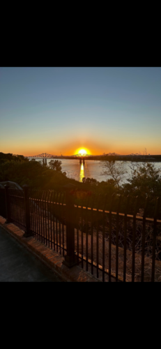 Sunset-through-the-piers-by-Donnie-Overton