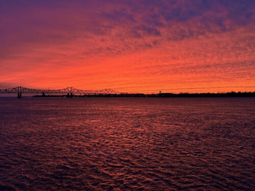 Sunset-under-the-hill-by-Reuben-Metcalf